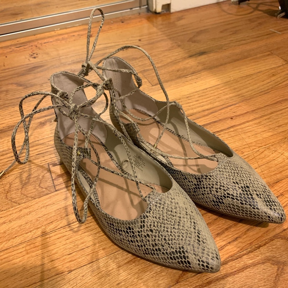 Laceup snakeskin flats